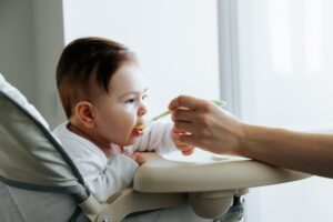 Soft baby food with a spoon